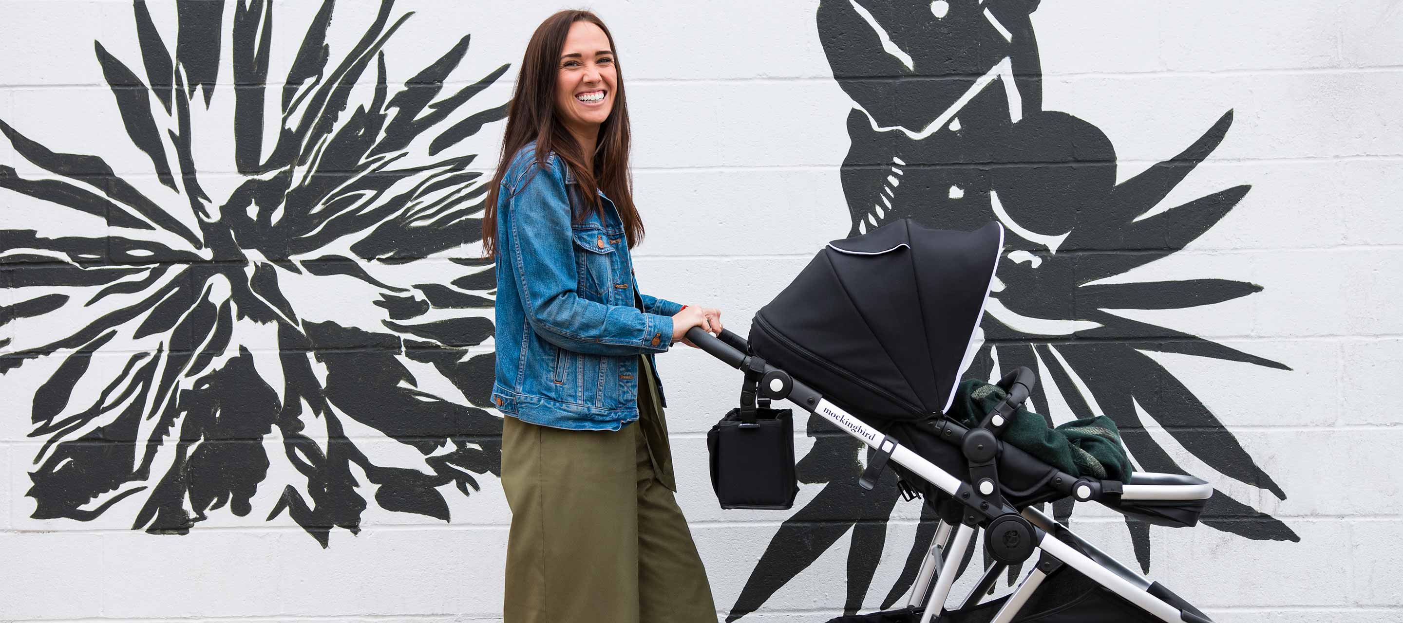 Mockingbird Stroller | Woman Walking with Stroller