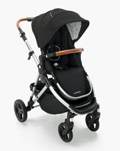 Modern black Mockingbird Single Stroller 2.0 baby stroller with wooden handlebar and large wheels, isolated on white background. #color_black