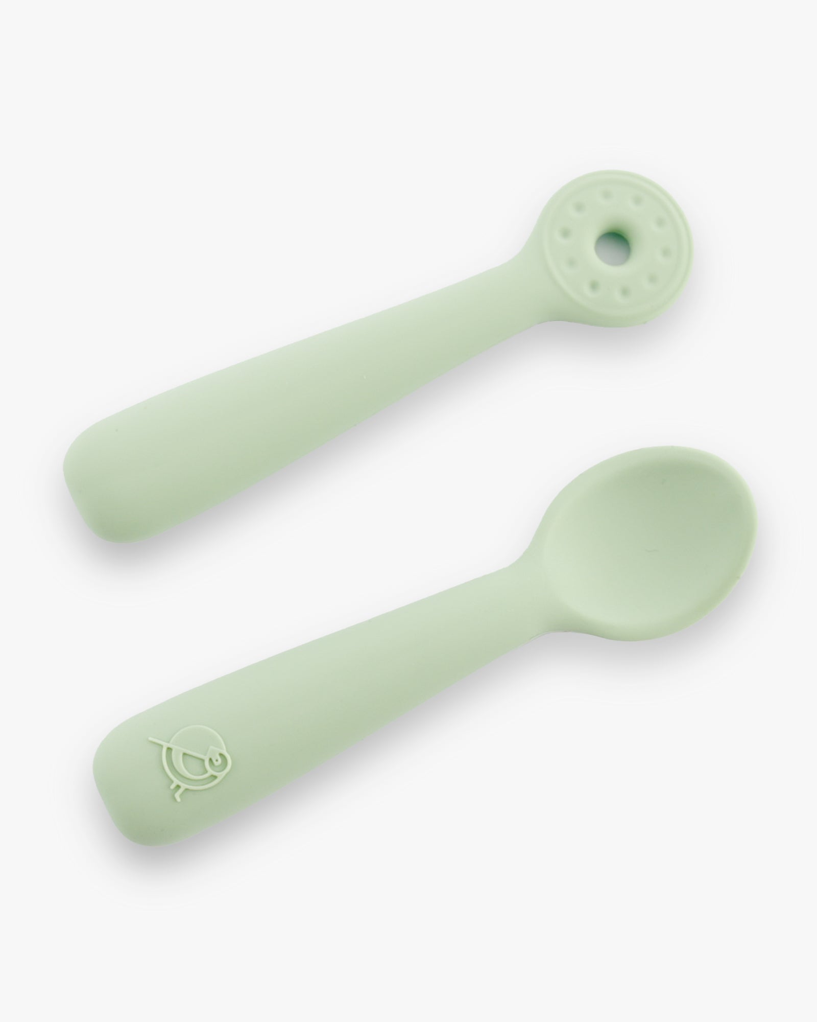 Mockingbird dishware set showing the sage green spoon and dipper