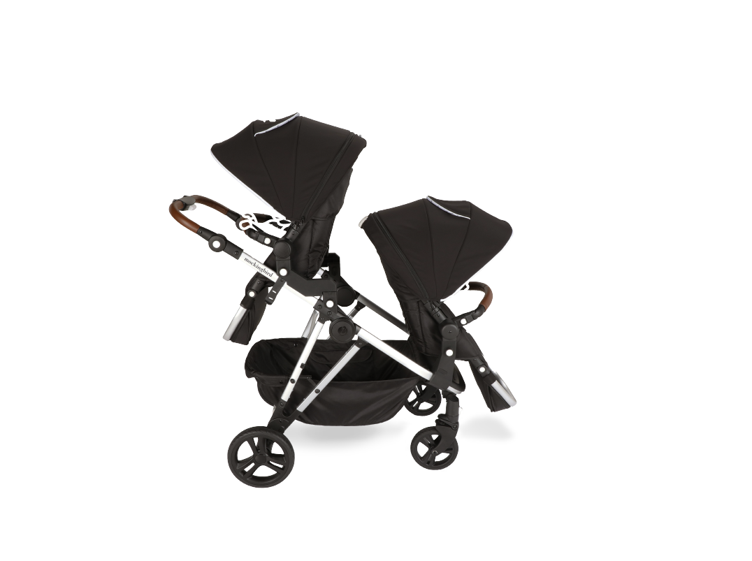 Double baby stroller with black canopies, facing opposite directions, isolated on a white background.