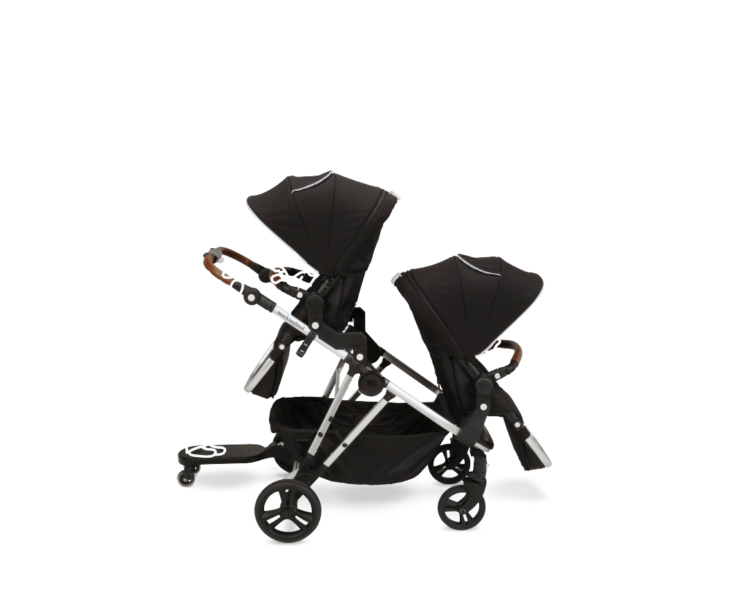 A twin stroller with two connected seats on a four-wheeled frame, each with a black canopy and under-seat storage, isolated on a white background.
