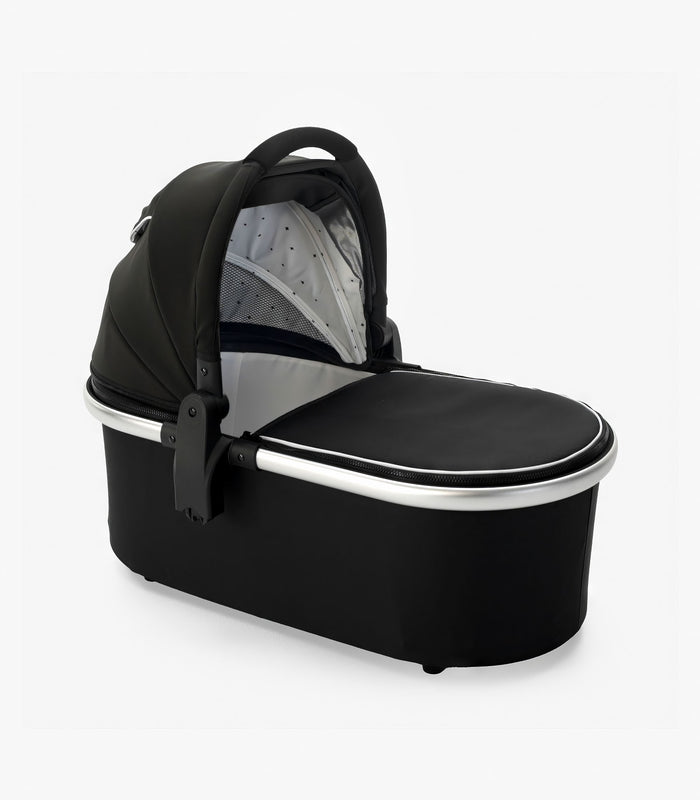 A modern black mockingbird-prod Stroller bassinet with a canopy, viewed against a white background. #color_black