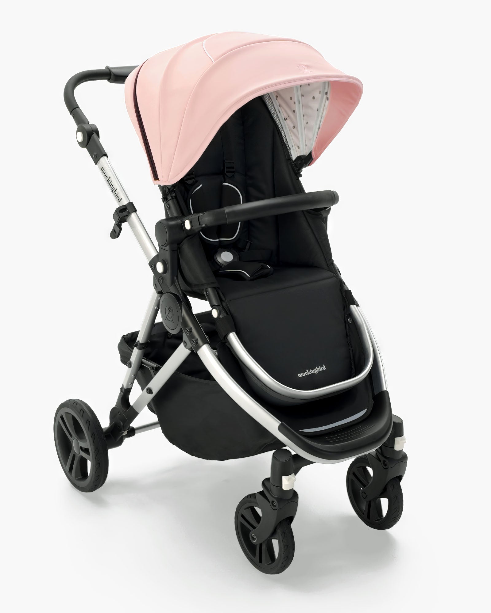 A modern Mockingbird Single Stroller 2.0 baby stroller with a black frame and pink canopy on a white background. #color_bloom
