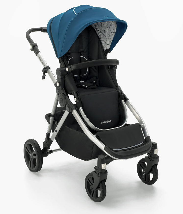 Modern baby stroller with a blue canopy, black seat, and a grey Mockingbird Single-to-Double Stroller 2.0 frame, set against a white background. #color_sea