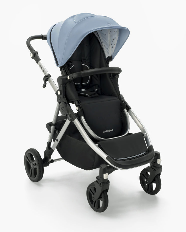 Modern Mockingbird Single-to-Double Stroller 2.0 with adjustable blue canopy, reclining black mockingbird seat, and sturdy grey frame on white background. #color_sky