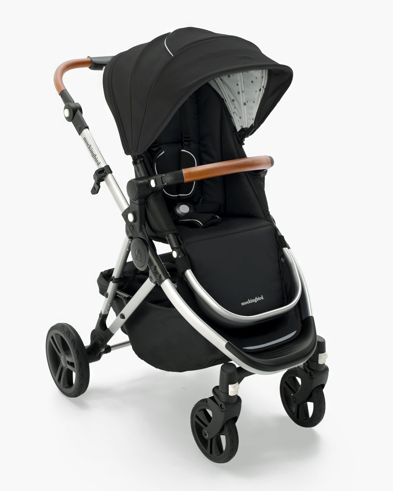 Modern black Mockingbird Single Stroller 2.0 baby stroller with large wheels, adjustable canopy, and brown handles, isolated on a white background. #color_black