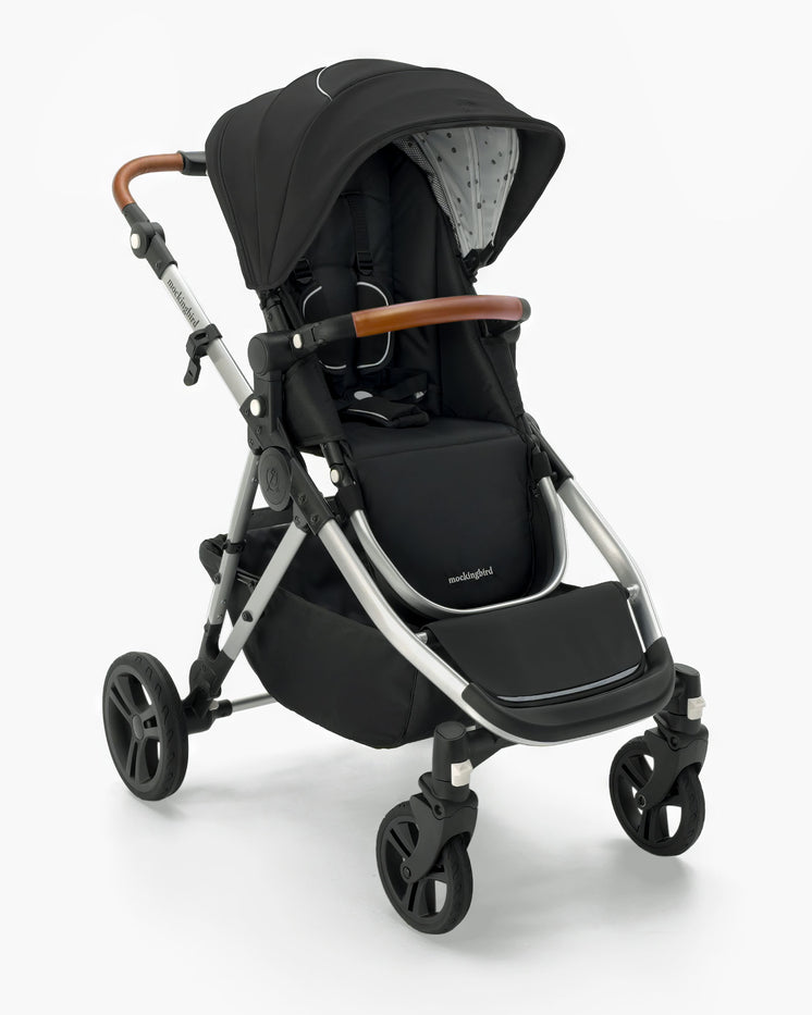 Modern black Mockingbird Single-to-Double Stroller 2.0 baby stroller with adjustable handle, large wheels, and a full canopy, isolated on a white background.  #color_black