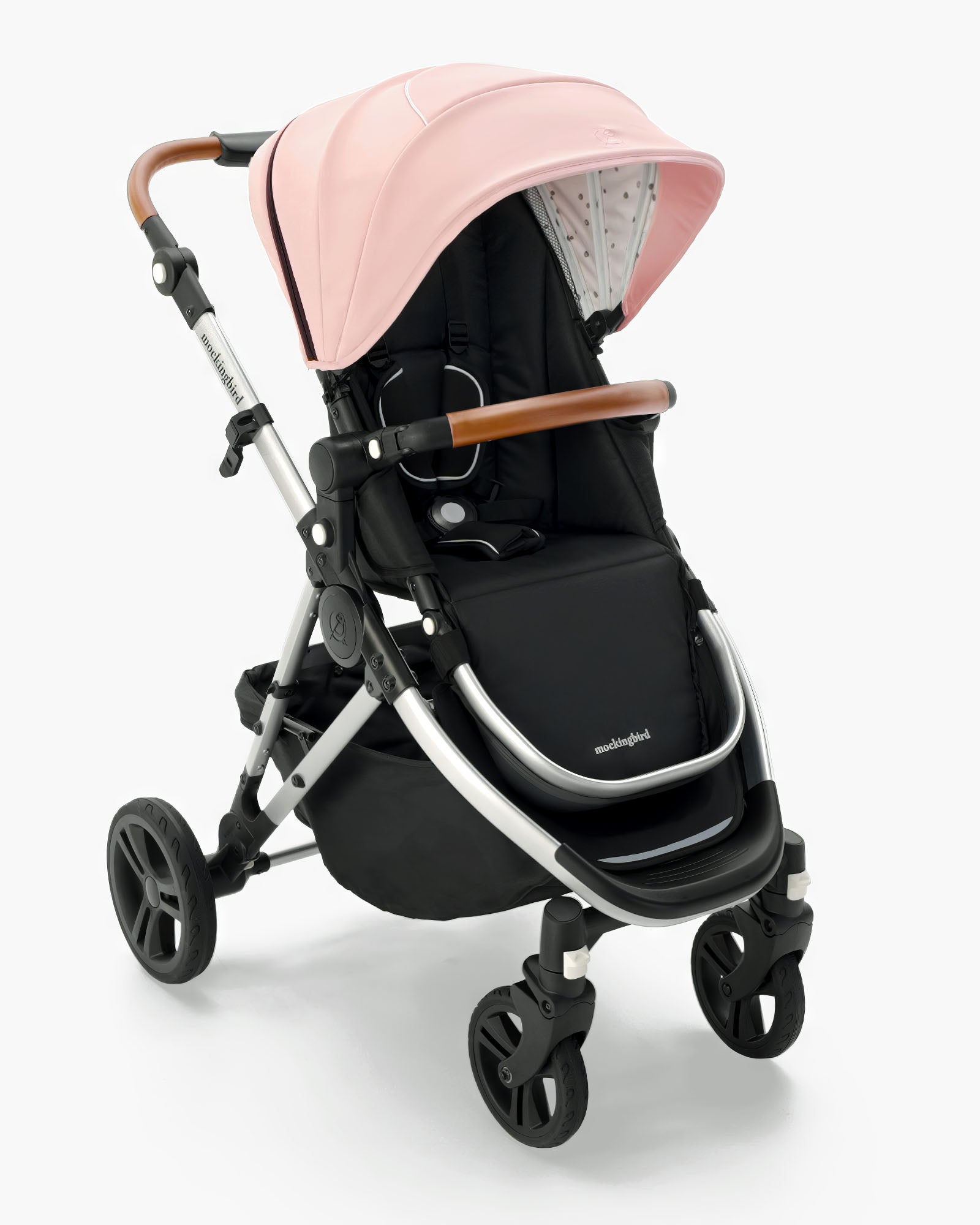 Modern Mockingbird Single Stroller 2.0 with a pink canopy and black seat from mockingbird, displayed against a white background. #color_bloom