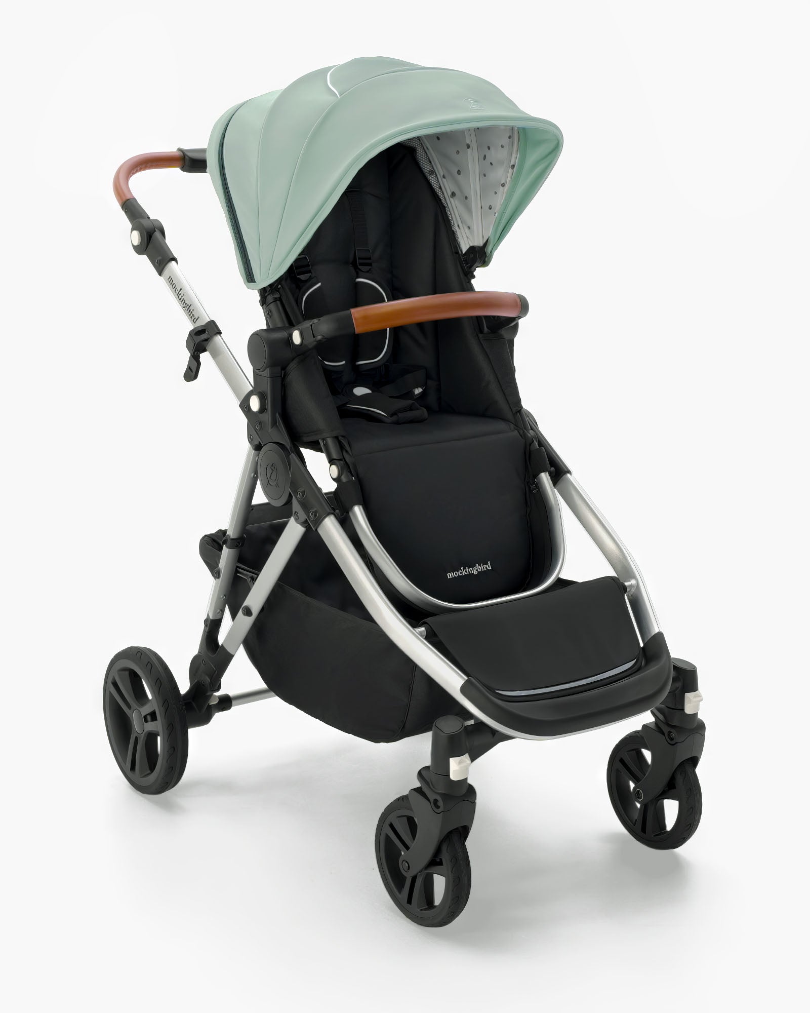 Modern Mockingbird Single-to-Double Stroller 2.0 baby stroller in mint green with an adjustable canopy and reclining black seat, isolated on a white background. #color_sage