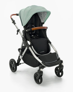 A modern mockingbird-prod Single-to-Double Stroller 2.0 with mint green canopy, black seat, and gray frame on a white background. #color_sage