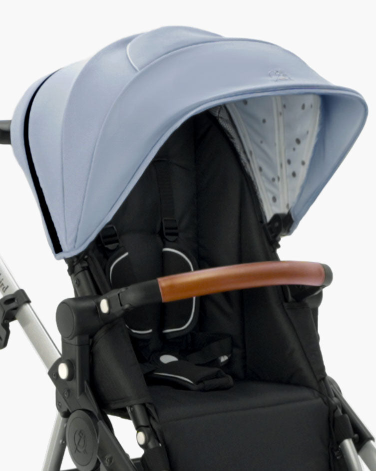 Modern Extra Stroller Canopy 2.0 model with a blue canopy, black seat, and a brown handle on a white background by mockingbird. #color_sky