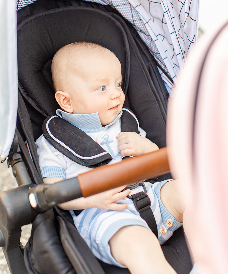 Infant in the Mockingbird Stroller seat with Infant Seat Liner
