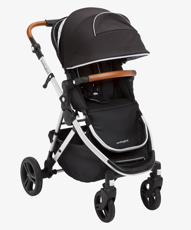 Stroller with canopy extended and back section open
